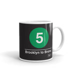 Classic Subway Logo Coffee Mugs | Ceramic mug with a green circle featuring a white "5". Text below reads: "Brooklyn to Bronx." Perfect for fans of the NYC Subway Line.
