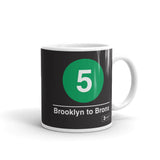 Classic Subway Logo Coffee Mugs | Ceramic mug with a green circle featuring a white "5". Text below reads: "Brooklyn to Bronx." Perfect for fans of the NYC Subway Line.
