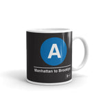 Classic Subway Logo Coffee Mugs | Ceramic mug with a blue circle featuring a white "A". Text below reads: "Manhattan to Brooklyn." Perfect for fans of the NYC Subway Line.