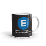 Classic Subway Logo Coffee Mugs | Ceramic mug with a blue circle featuring a white "E". Text below reads: "Manhattan to Queens." Perfect for fans of the NYC Subway Line.