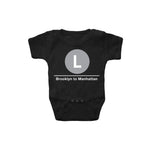 Baby Classic Subway Logo Romper | Black romper with a blue circle featuring a white "L". Text below reads: "Brooklyn to Manhattan." Perfect for fans of the NYC Subway Line.