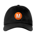 Classic Subway Baseball Caps | Black Baseball Cap with a orange circle featuring a white "M". Text below reads: "Manhattan." Perfect for fans of the NYC Subway Line.
